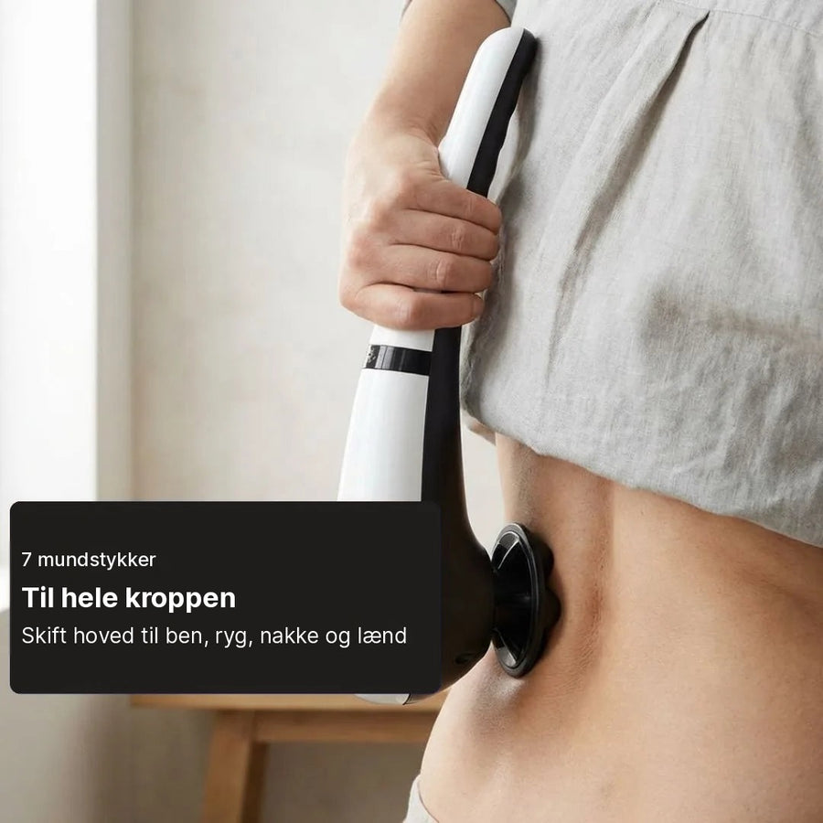 Kvinde masserer lænden med Feevra Relevo Pro håndmassager
